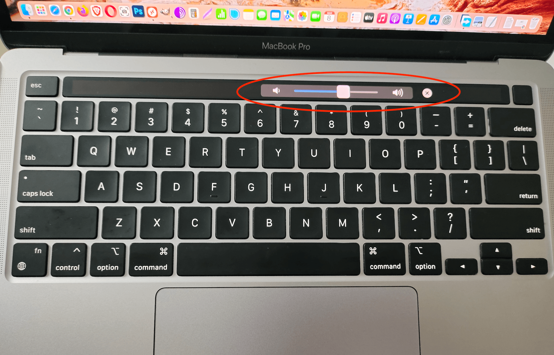 Volume up on mac via touch bar