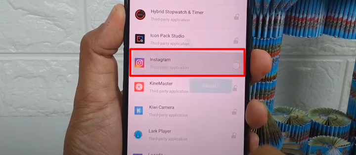 tap on the lock icon next to Instagram